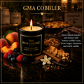 The Bear Essence GMA Cobbler candle with baked peaches, berries, brown sugar, and cinnamon on dark marble